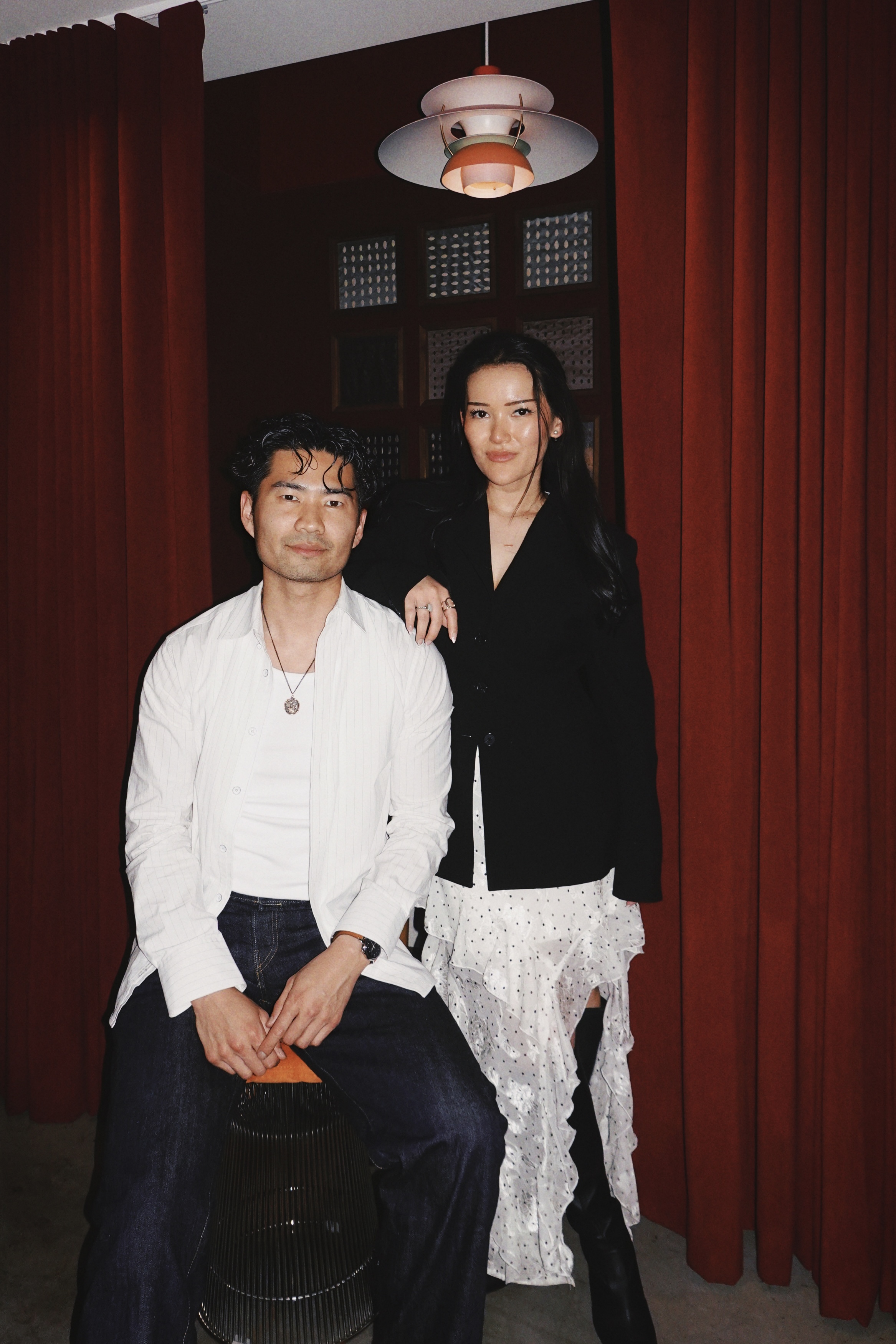 Red curtain, client and stylist